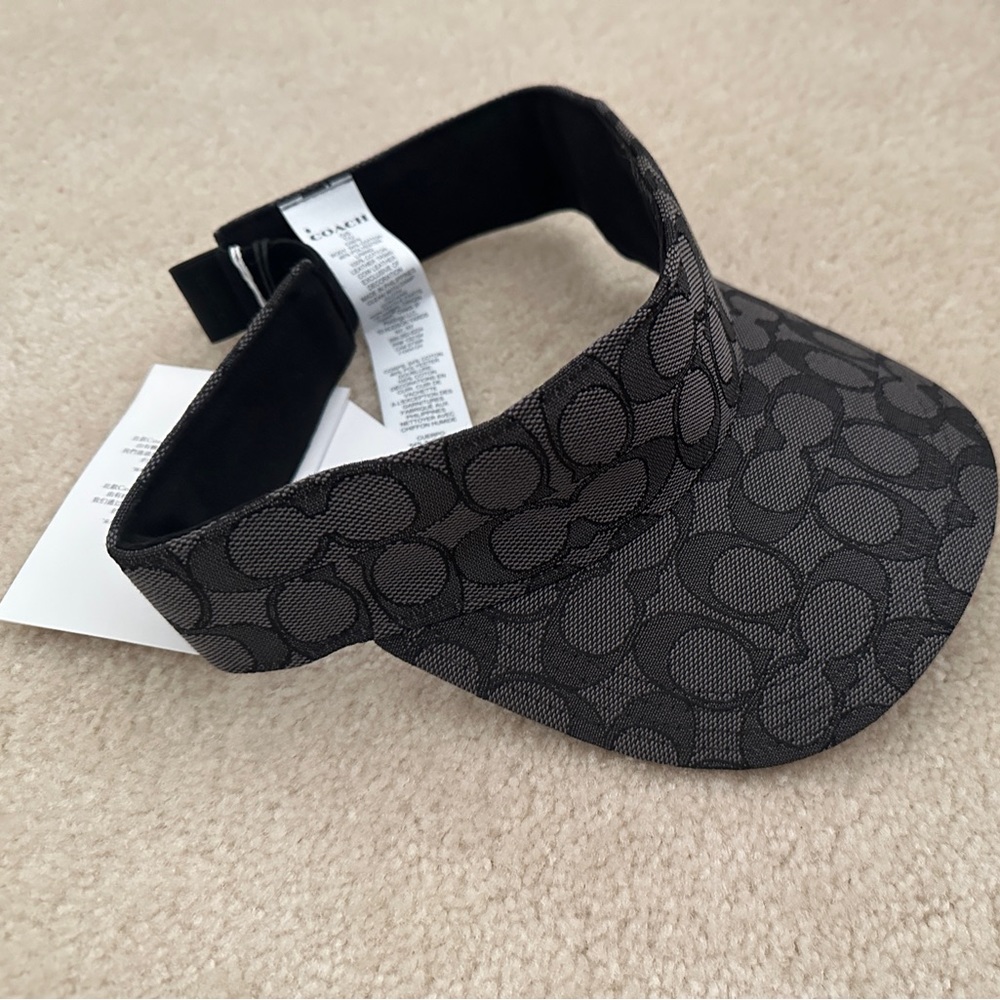 Black Coach signature visor never worn